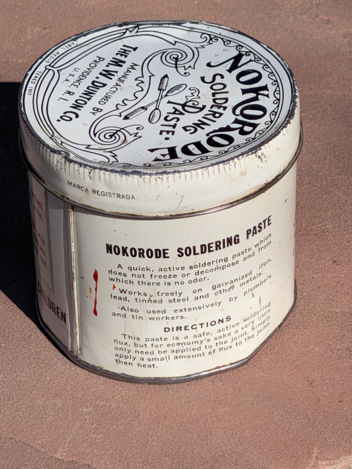 Nokorode Soldering Paste Tin 3” wide x 3 1/2″” tall 1926 Patent $8.50