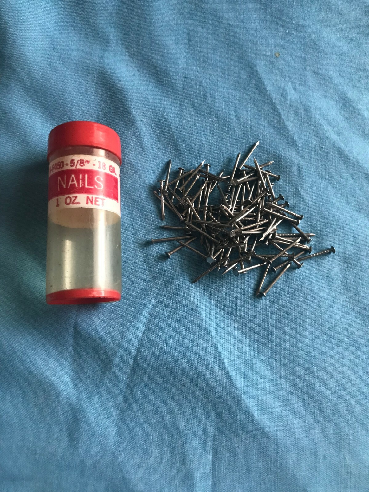 Pre-Owned Vintage Tower Mfg. Corp. Plastic Red & White Container w/ 5/8″ Nails