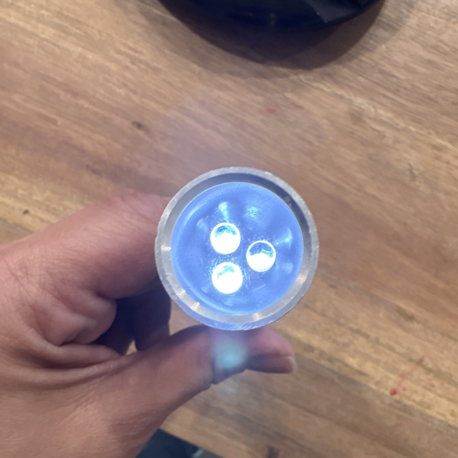 Silver LED Flashlight with Blue Button, Collectible Pocket Torch, Unique Design