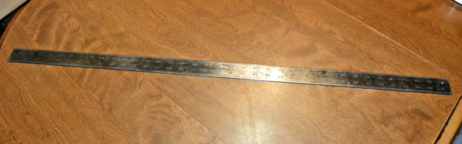 THE L S. STARRETT CO. HEAVY SPRING STEEL NO 410, 4′ STEEL RULE TEMPERED NO.4