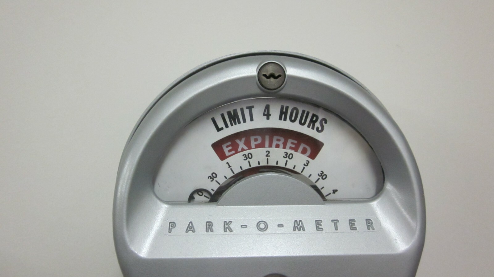 Top key for Parking meters with a lock that is stamped POM