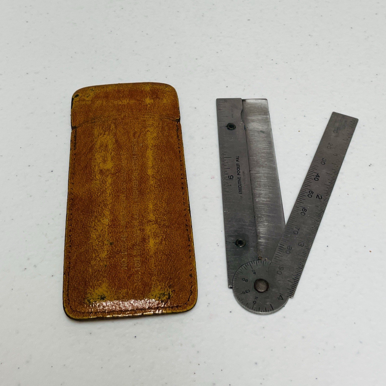 The Executive Pocket Pal Stainless Steel Folding Rule Tool Leather Case