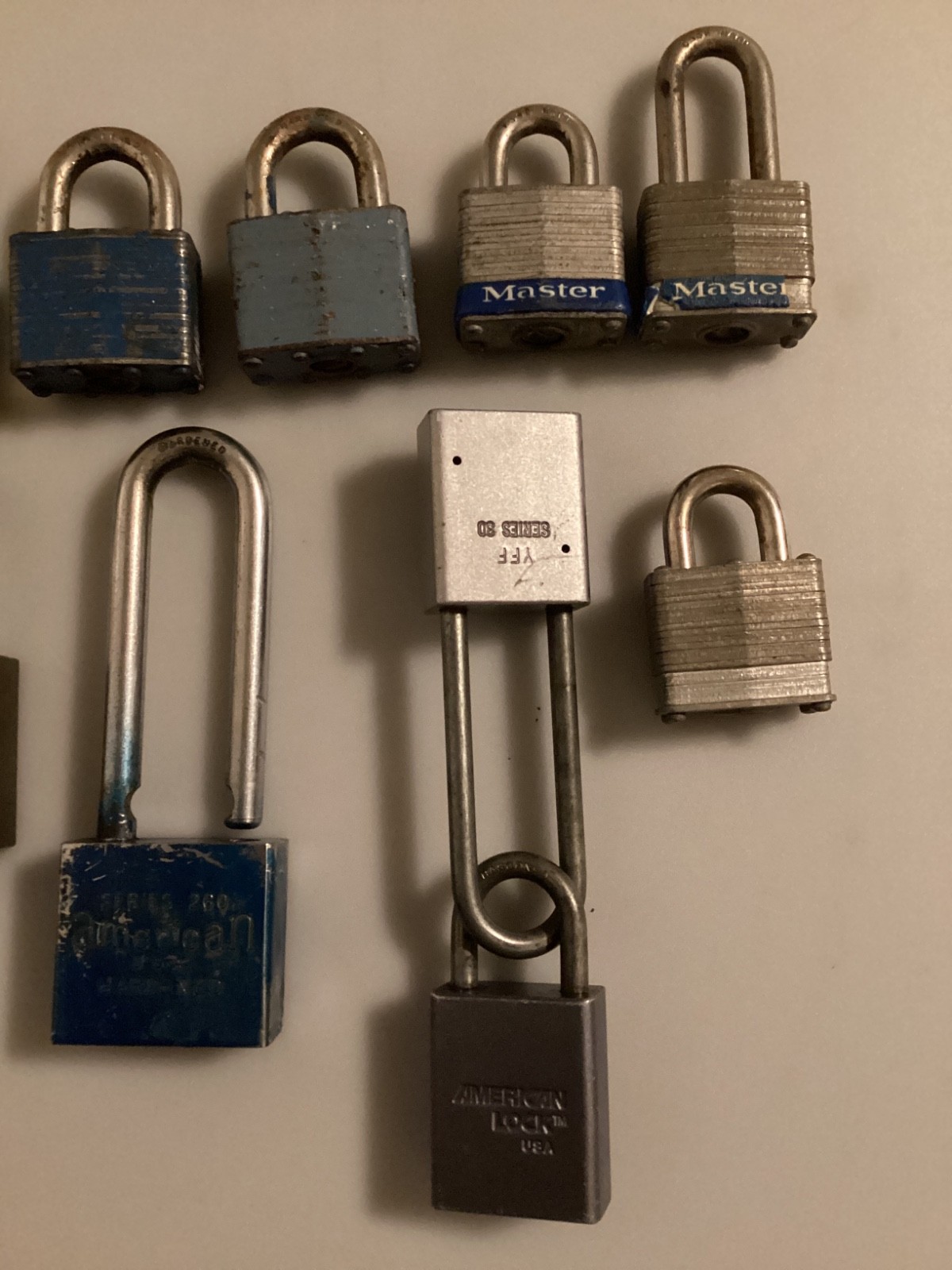 12 TWELVE PADLOCKS SEVEN MASTERLOCKS, SIX AMERICAN LOCKS, NO KEYS