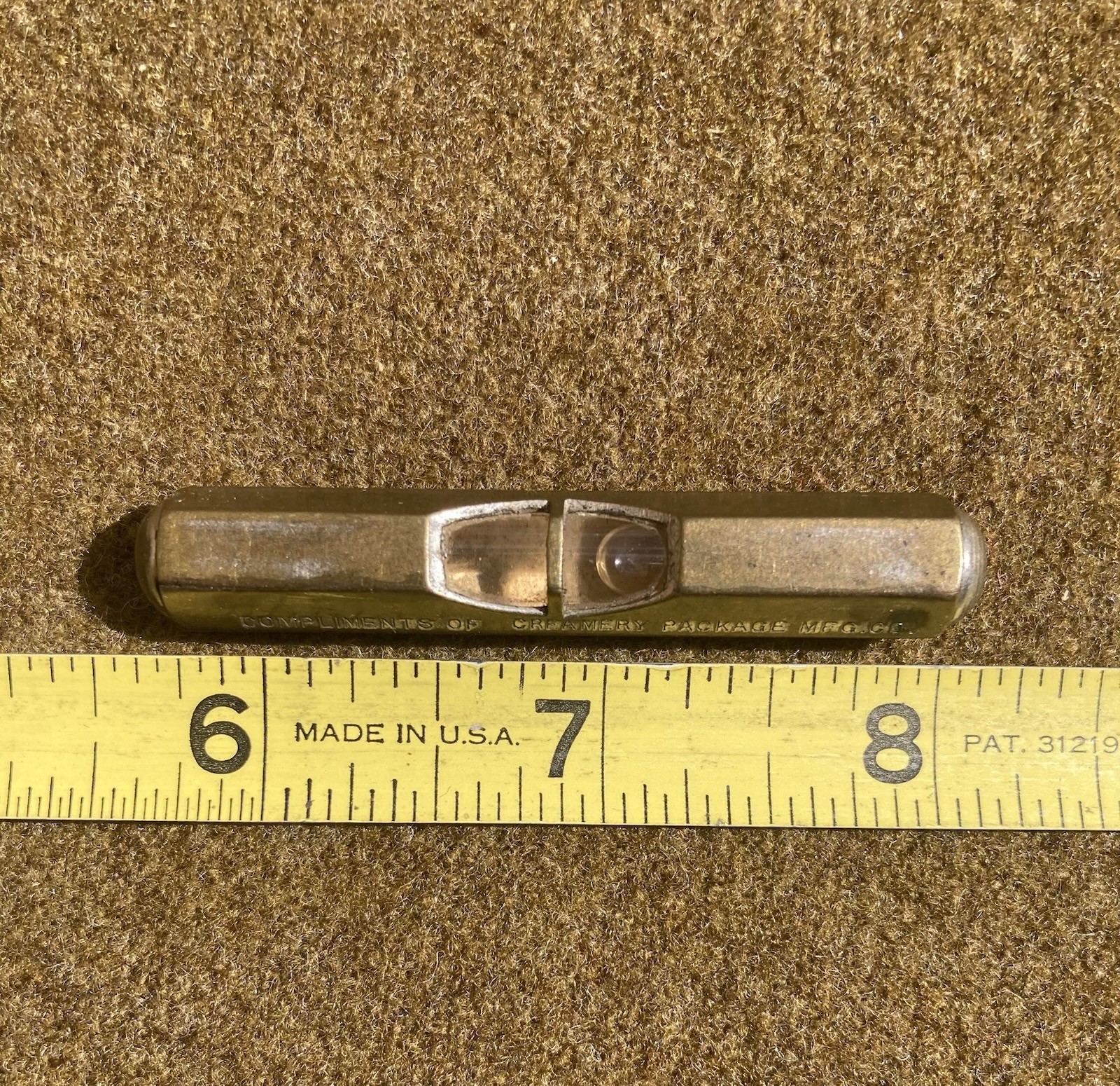 Vintage Brass Level Pocket Size Advertising Creamery Package Mfg. Co.