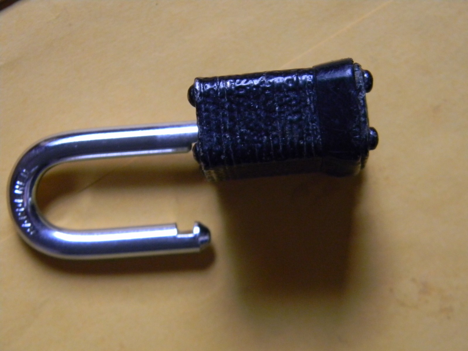 NO KEYS !! Rare Vintage Master padlock with black coating on bottom