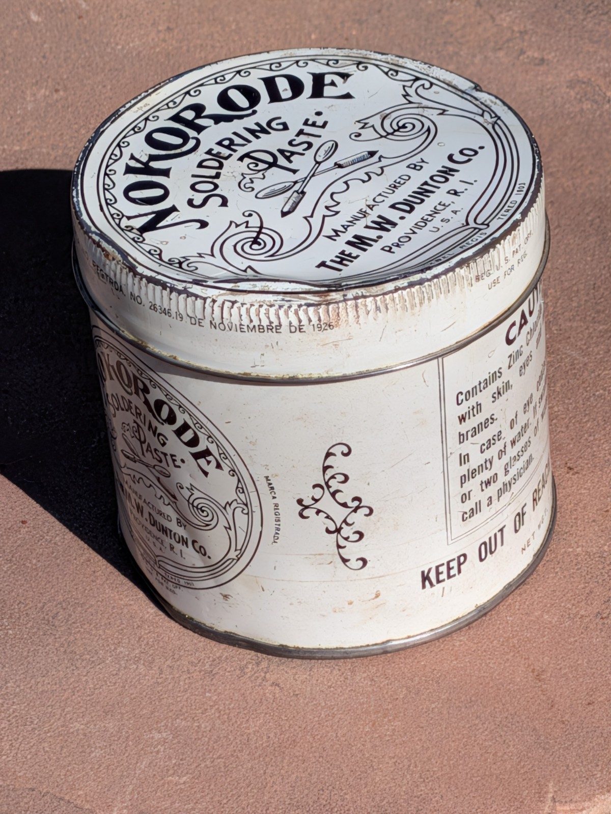 Nokorode Soldering Paste Tin 3” wide x 3 1/2″” tall 1926 Patent $8.50
