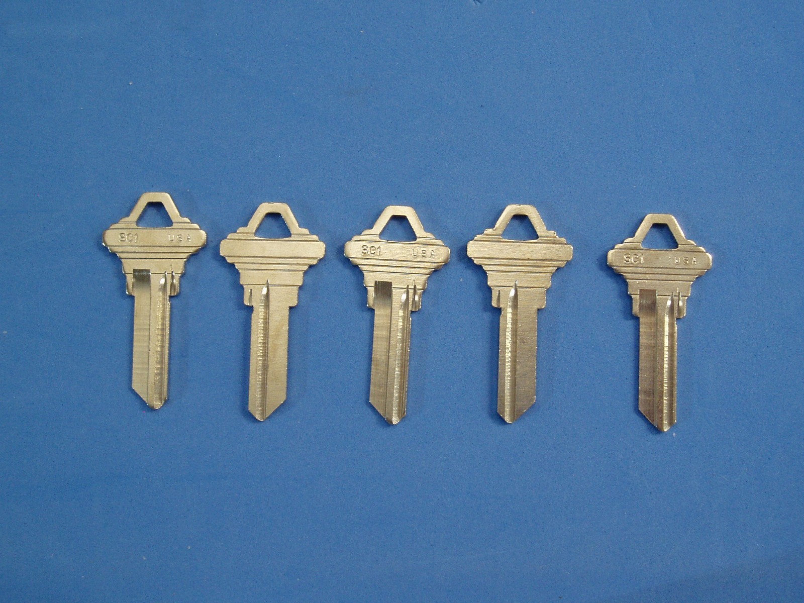 LOT OF 34 PC KEY BLANKS FIT KWIKSET SCHLAGE RUSSWIN MADE IN USA KW1 SC1 RU45