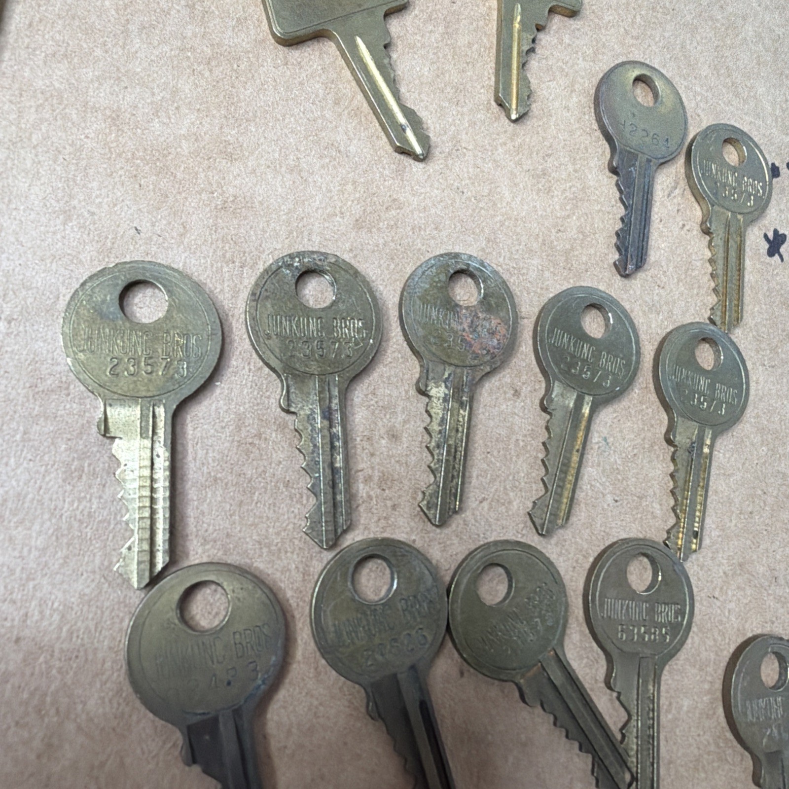 Assortment Of 19 Cut Keys Marked Junkunc Bros and American