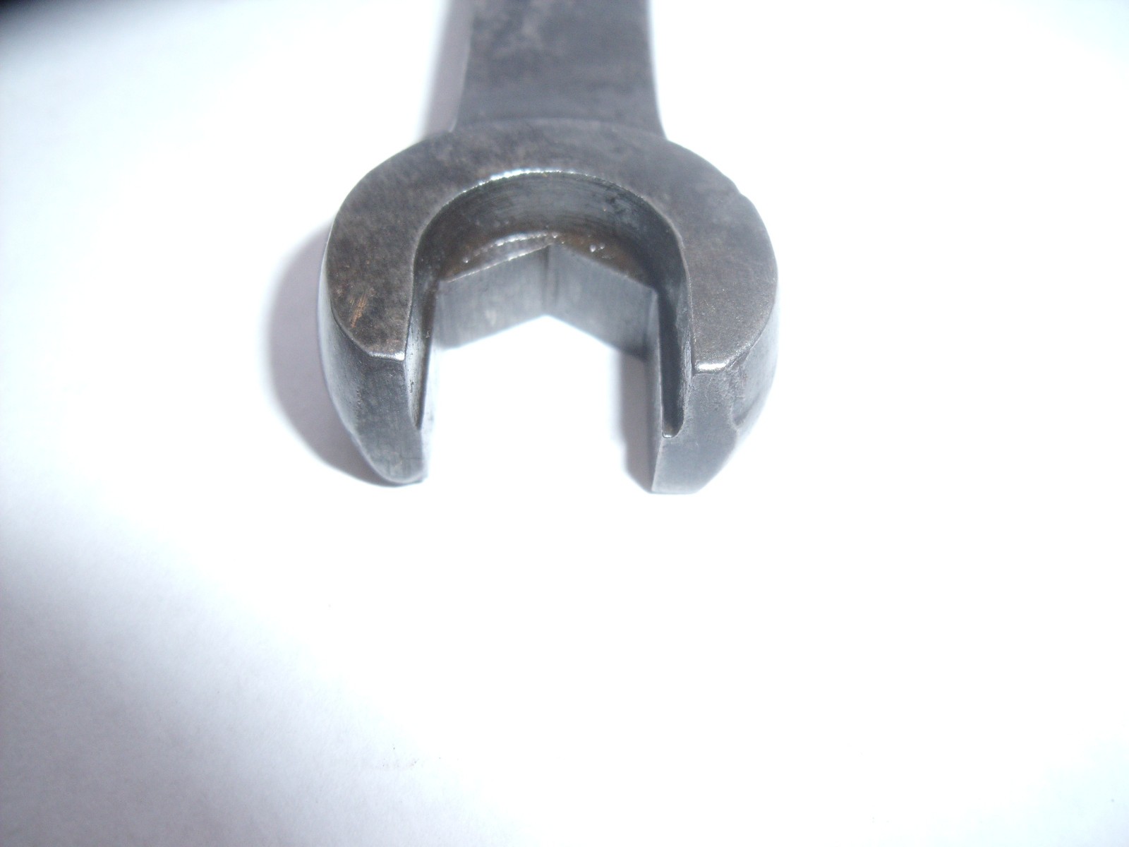 Coventry Climax 4 way multi spanner. 4″ long.