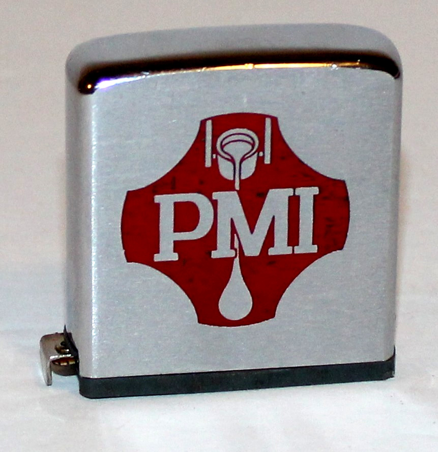 PMI Logo Tape Measure by Zippo Manufacturing Bradford PA. USA Measures 60″/5′ GC