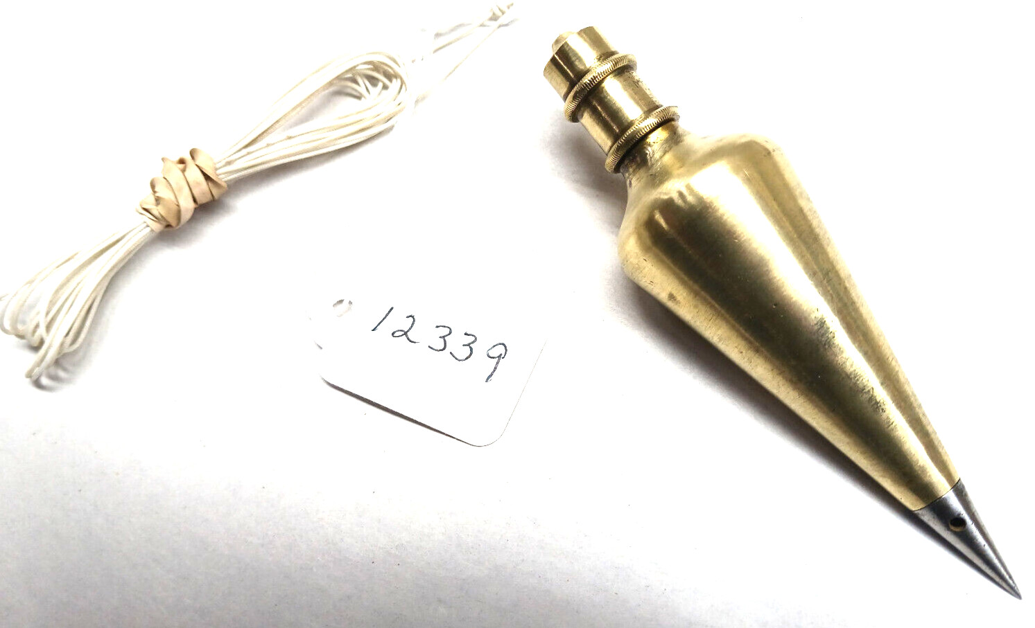 General Hardware Mfg. Co. 10 Oz. Brass, No. 800, PLUM BOB, 8″ of Twine, USA