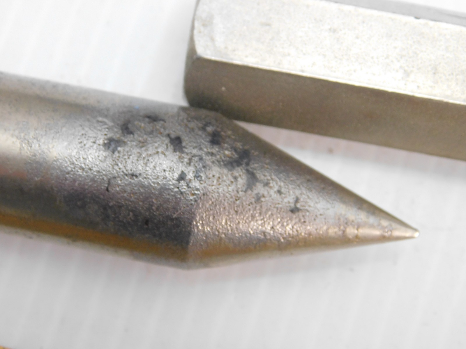 2 plumb Bobs , Miller Falls #3, 8 oz. 4″, plus an unmarked one