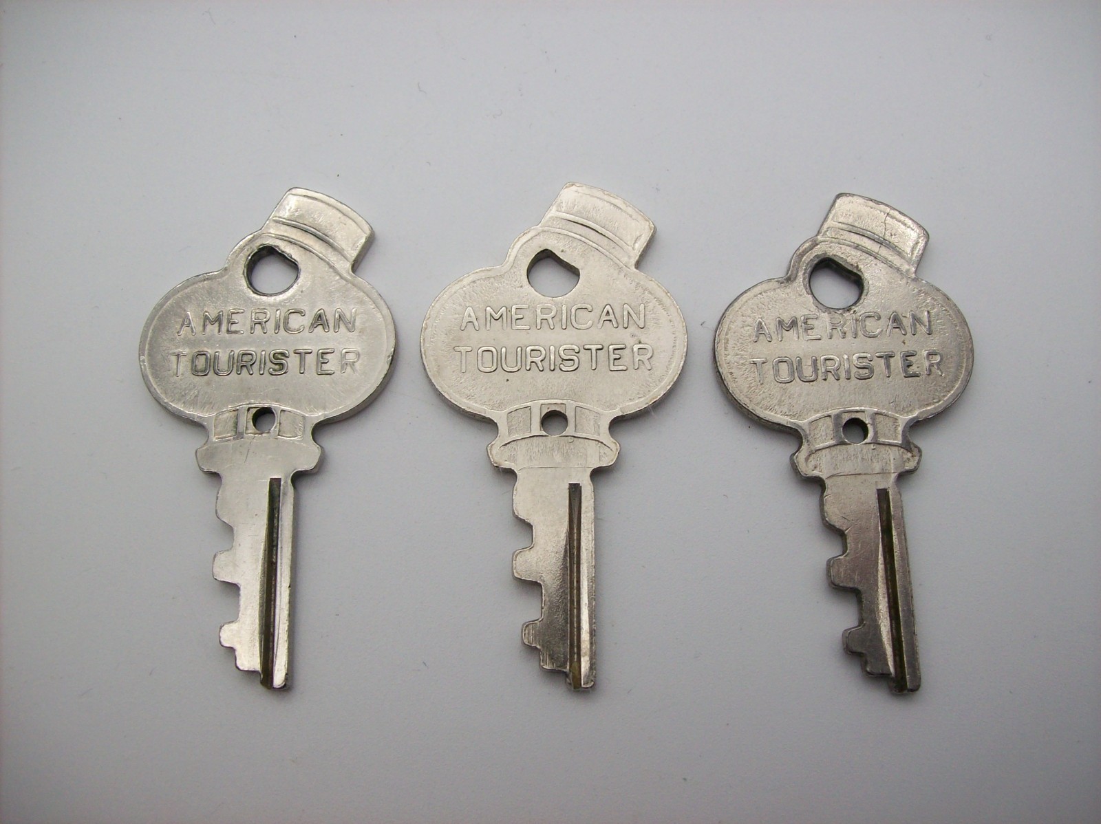 (3) Vintage AMERICAN TOURISTER Key Luggage Suitcase Case Smiling Bellhop