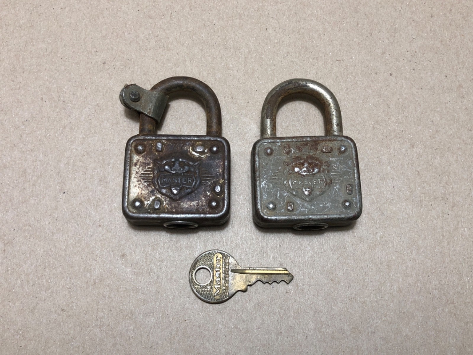 Vintage Master Lock Co. # 77 X2 Lot Embossed Lion Head Lock with Key USA Works