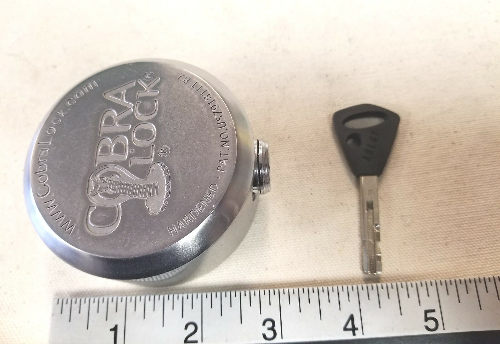 Cobra heavy steel puck lock with Abloy plug locking cylinder & 1 key