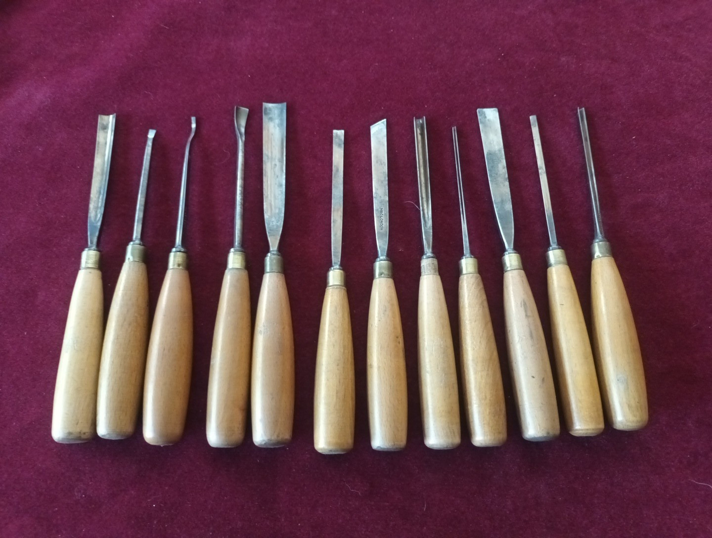 Vintage M & C of London twelve Cast Steel Carving Chisels with Beech Handles