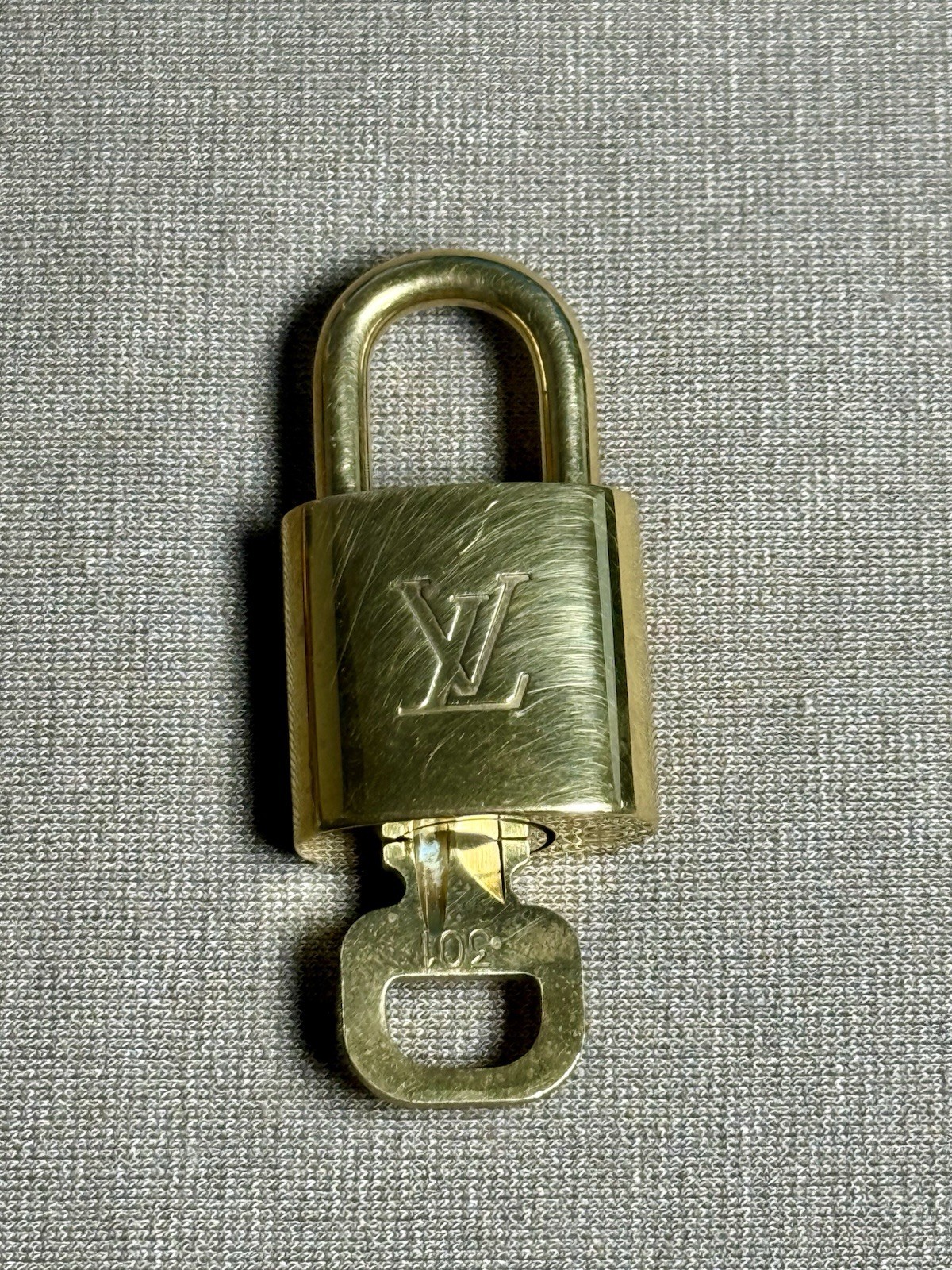 Louis Vuitton Leather Luggage Tag & Poignant & LV Padlock and Key