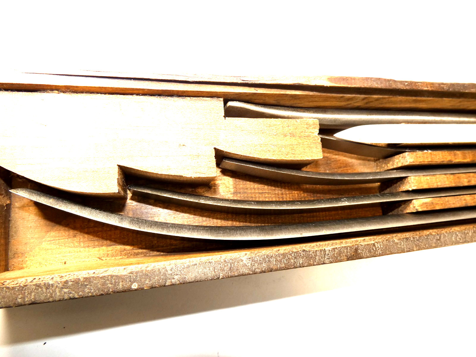 Set of six Mound Tool Steel scrapers; wood, sculpture