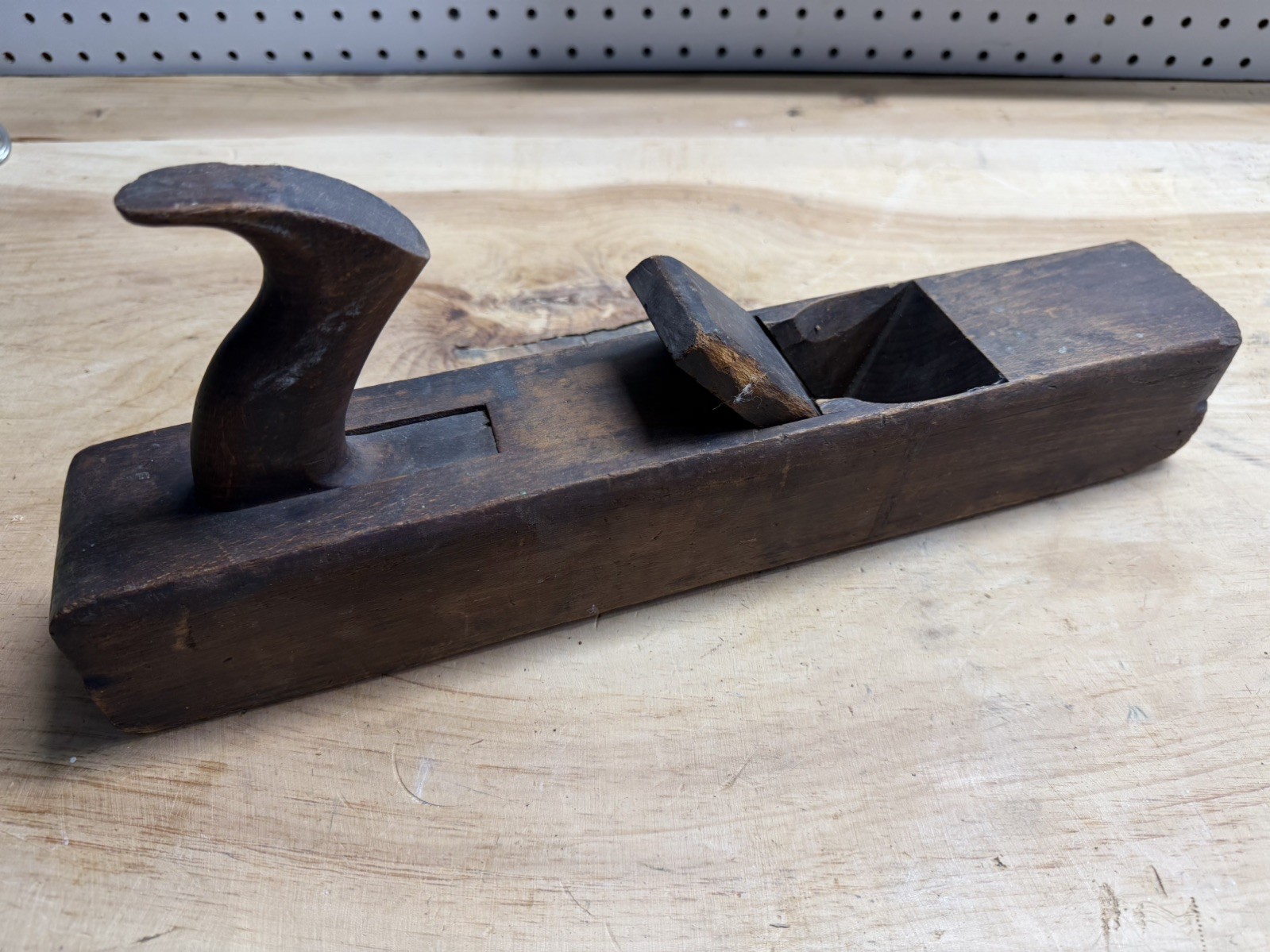 Antique wooden hand plane marked “Edward Carter – Troy, NY.”