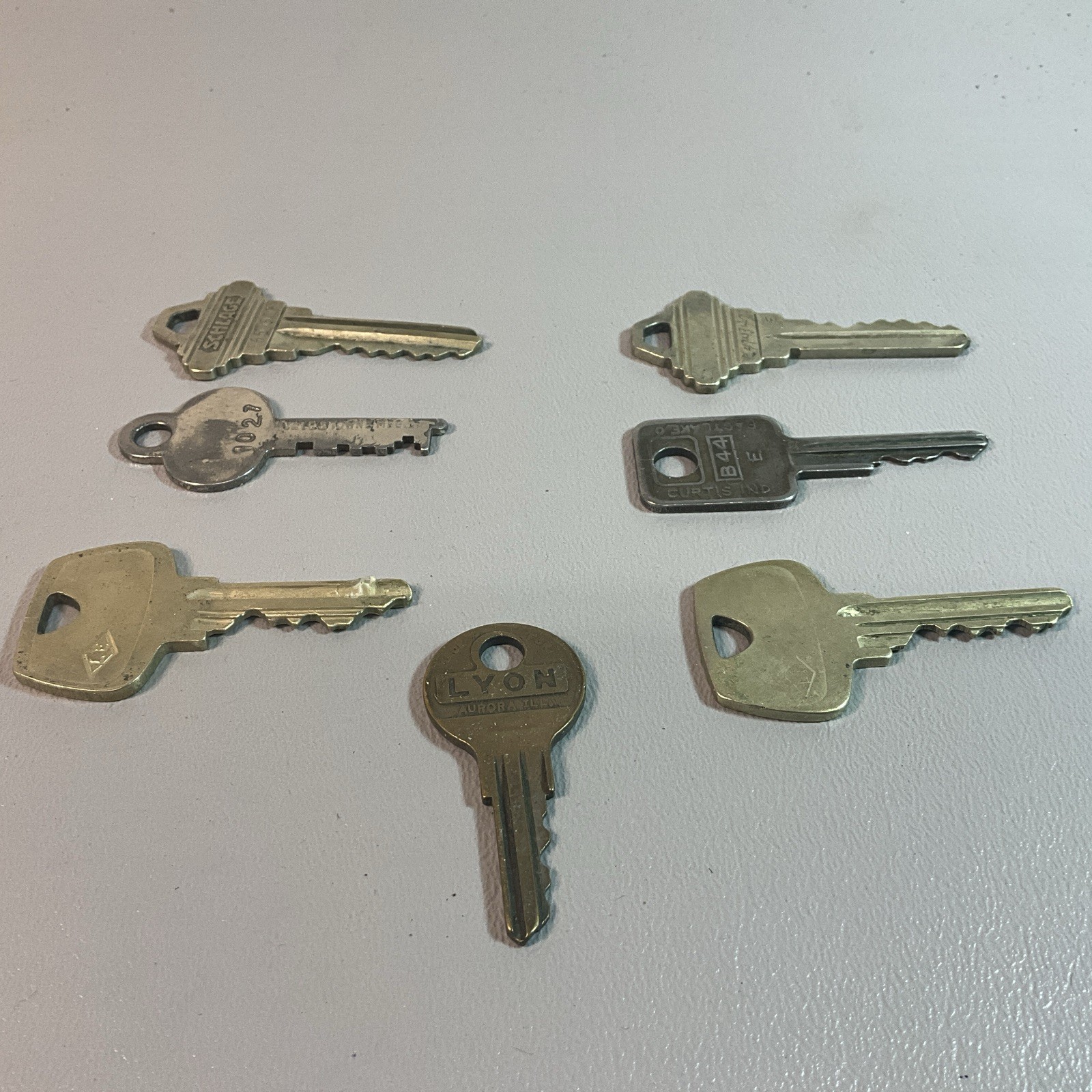 VINTAGE LOT OF SEVEN KEYS USED FOR ENTRY LOCKS. (S1321).