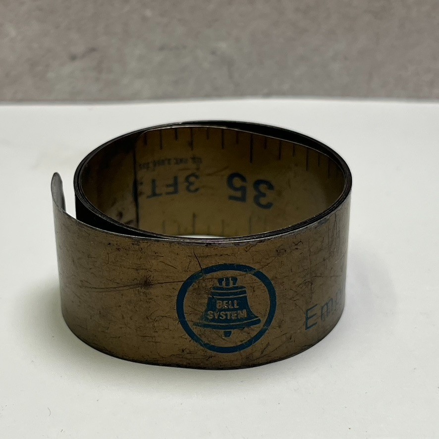 Vintage LUFKIN Magic Yard Stick Metal Roll-Up Slap Ruler, 36″ Bell System Advert
