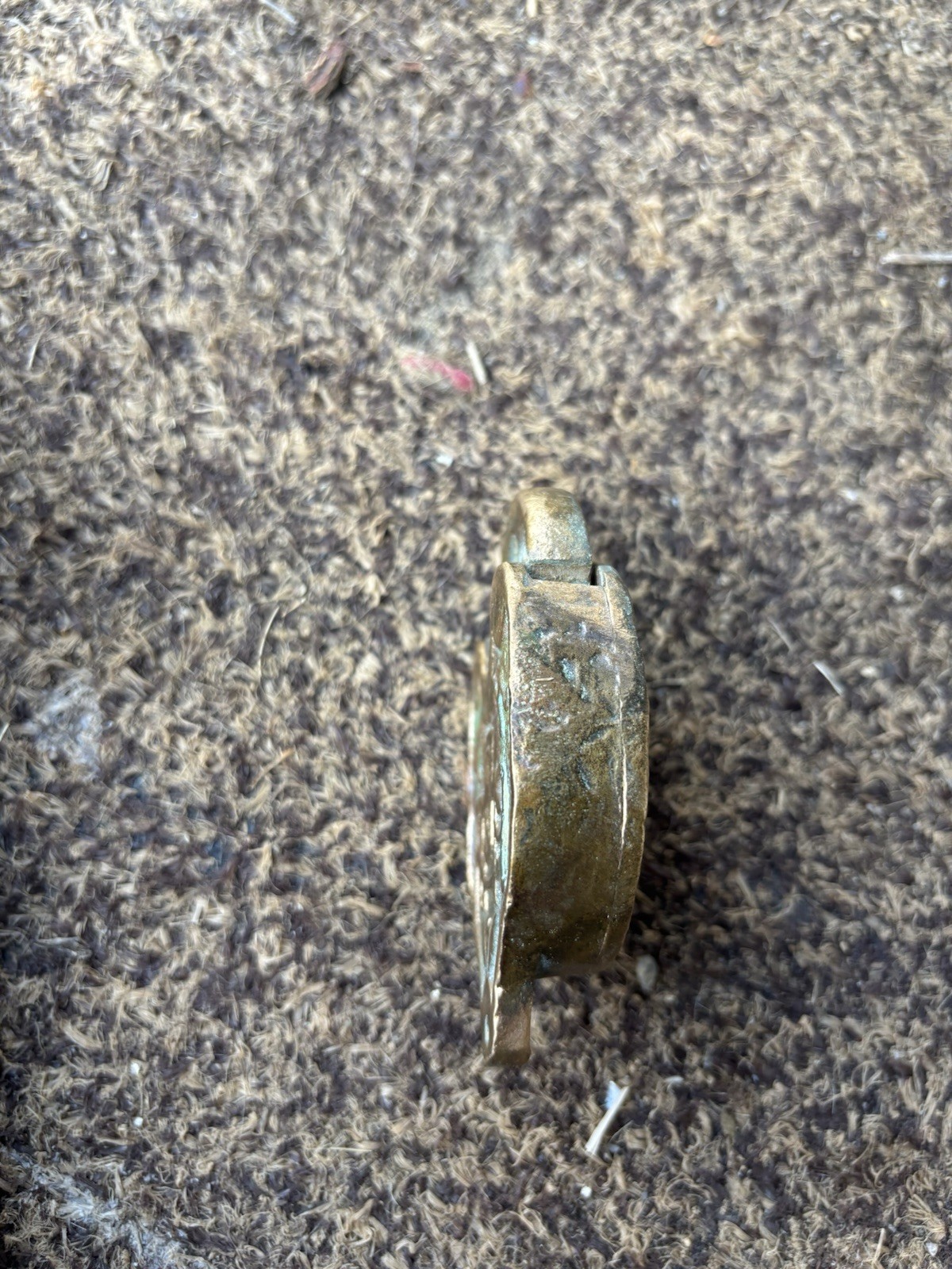 antique brass heart-shaped switch lock used by railroad