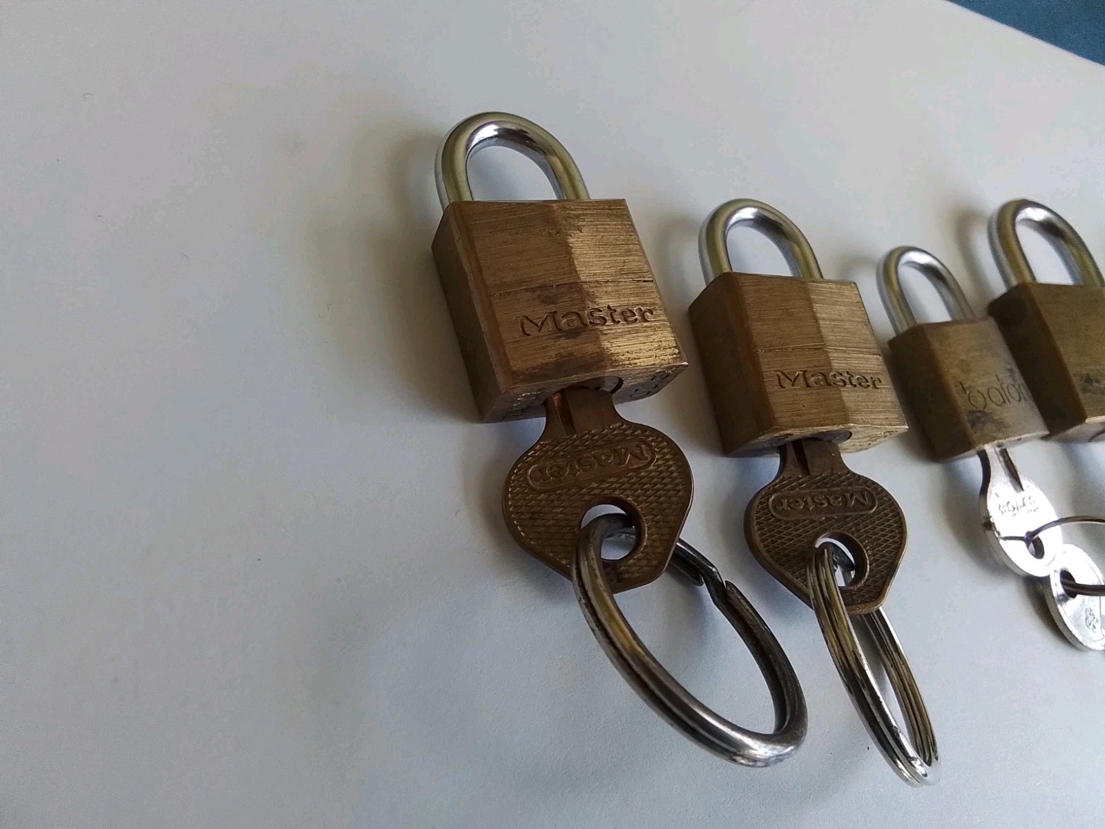 5 Brass Padlocks, 4 MASTER, 1 BATON, Medium/Small, w/Key Rings, 3 w/Extra Key