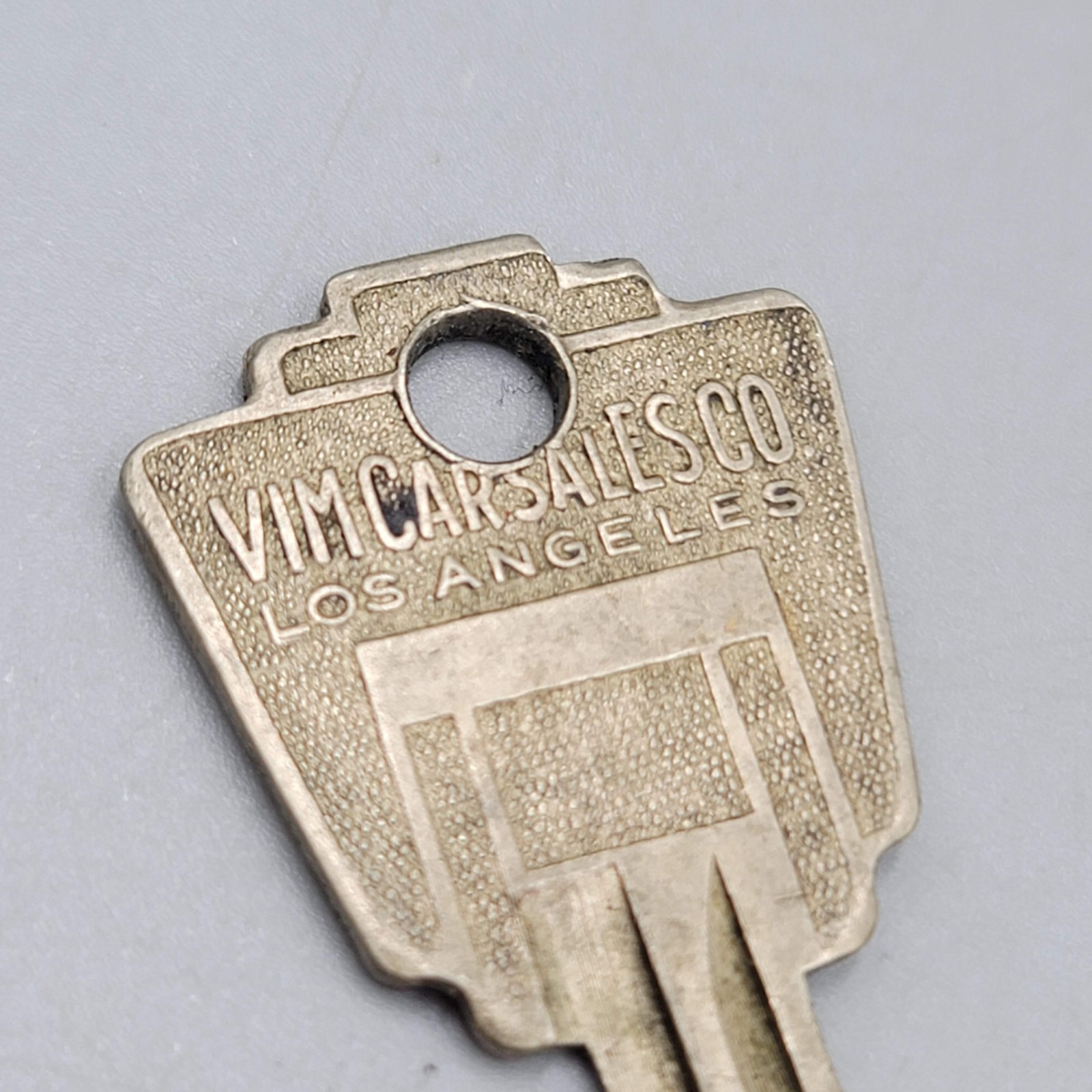 Vintage Olympic Royal Vim Car Sales Co Key 2″