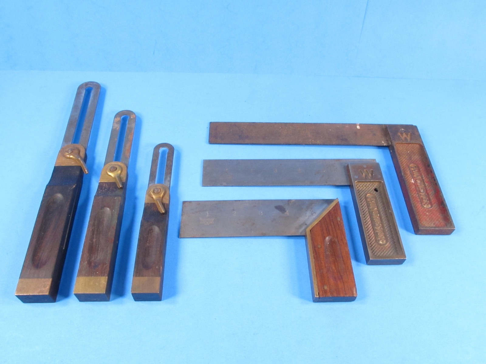 lot 3 Winchester wood bevels & 3 Winchester try & miter squares all are marked