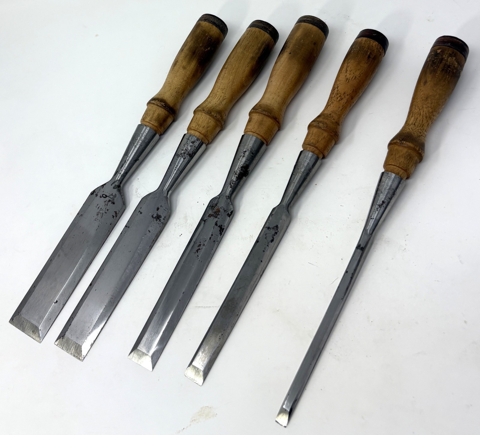 Five clean Greenlee Bench Chisels – 1 1/4″, 1″, 3/4″, 1/2″, 1/4″