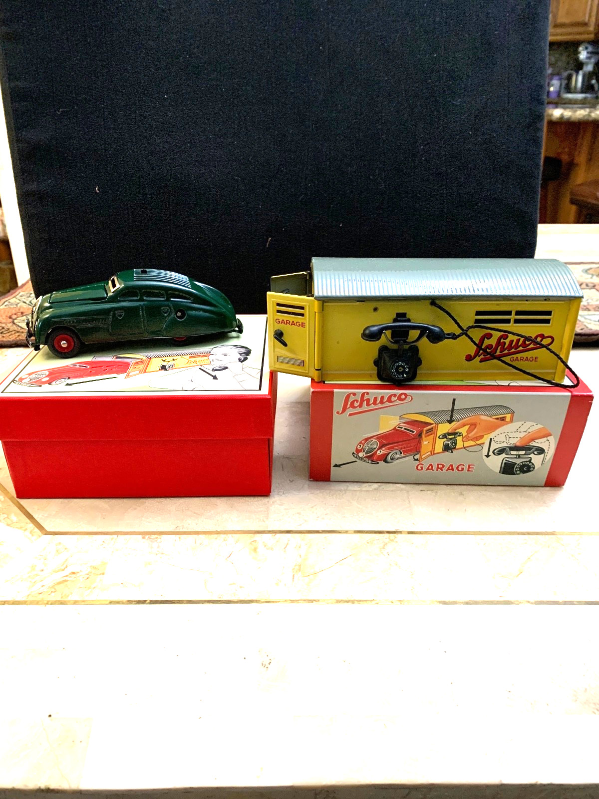 SCHUCO ,CAR ,GARAGE Steel NEVER PLAYED WITH,IN THE BOX.WORKS NEVER USED…