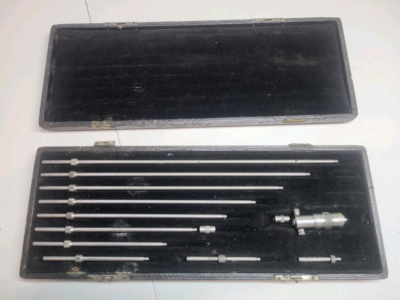Vintage L. S. Starrett Inside Micrometer Set w/(10) Rods (2″ – 10″) & Case USA.