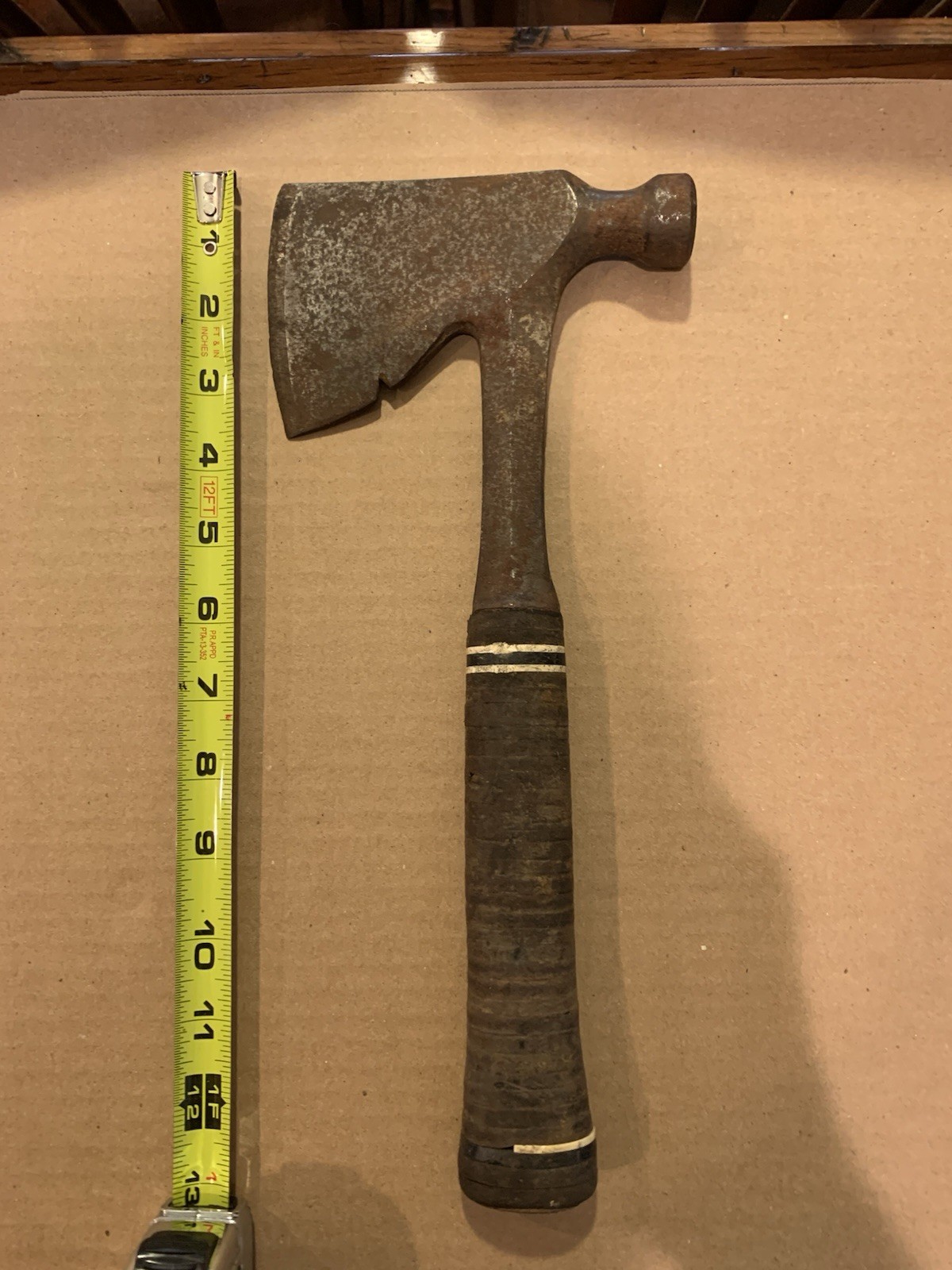 Vintage Estwing stacked leather carpenter axe 13 inch overall.
