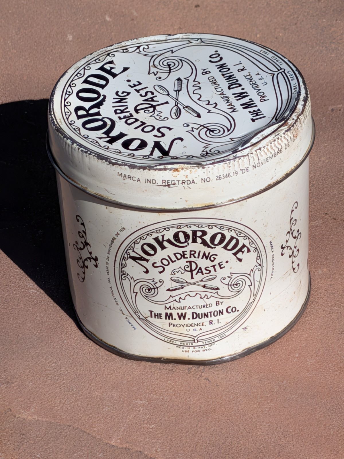 Nokorode Soldering Paste Tin 3” wide x 3 1/2″” tall 1926 Patent $8.50