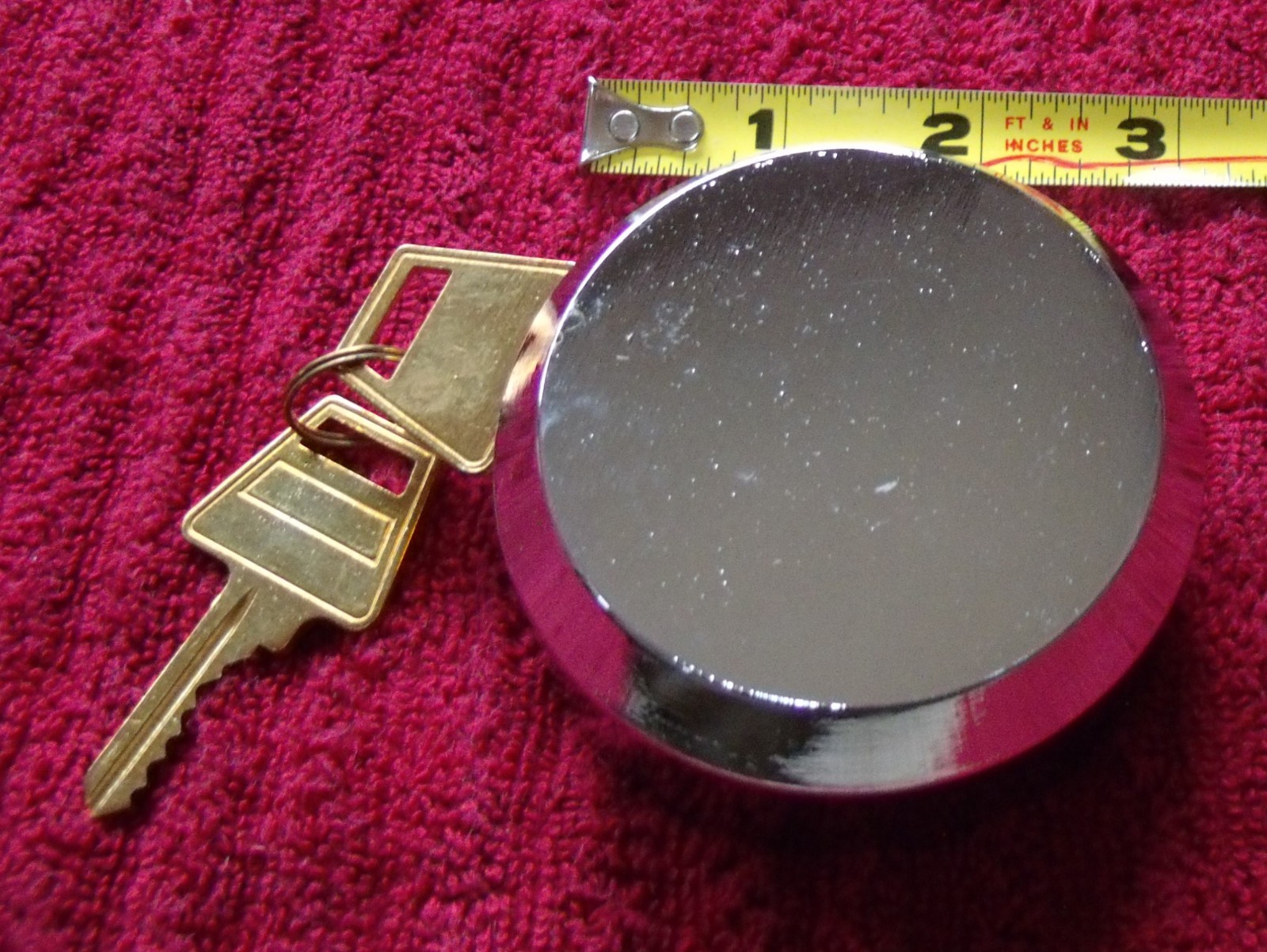 LOT OF FIVE KEYED ALIKE HOCKEY PUCK LOCKS,