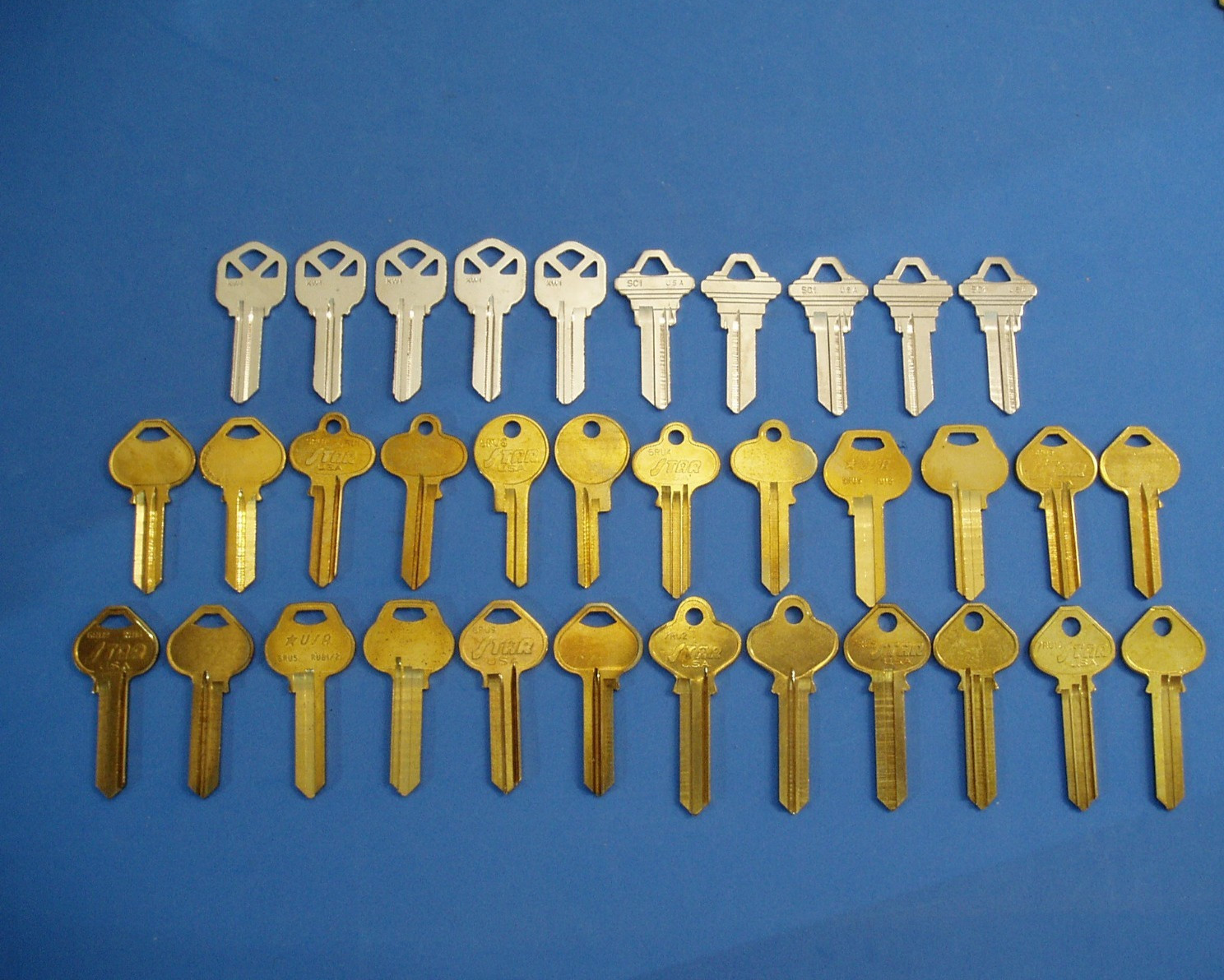 LOT OF 34 PC KEY BLANKS FIT KWIKSET SCHLAGE RUSSWIN MADE IN USA KW1 SC1 RU45