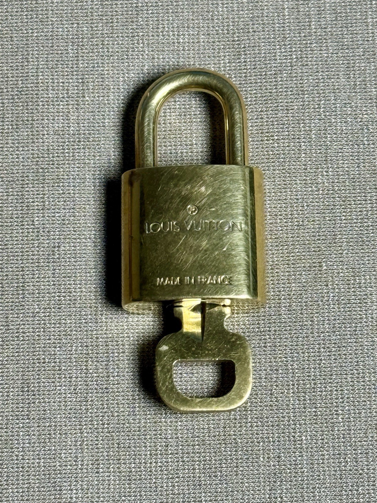 Louis Vuitton Leather Luggage Tag & Poignant & LV Padlock and Key