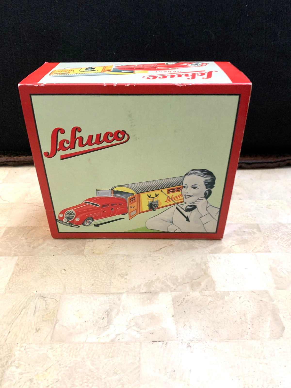 SCHUCO ,CAR ,GARAGE Steel NEVER PLAYED WITH,IN THE BOX.WORKS NEVER USED…