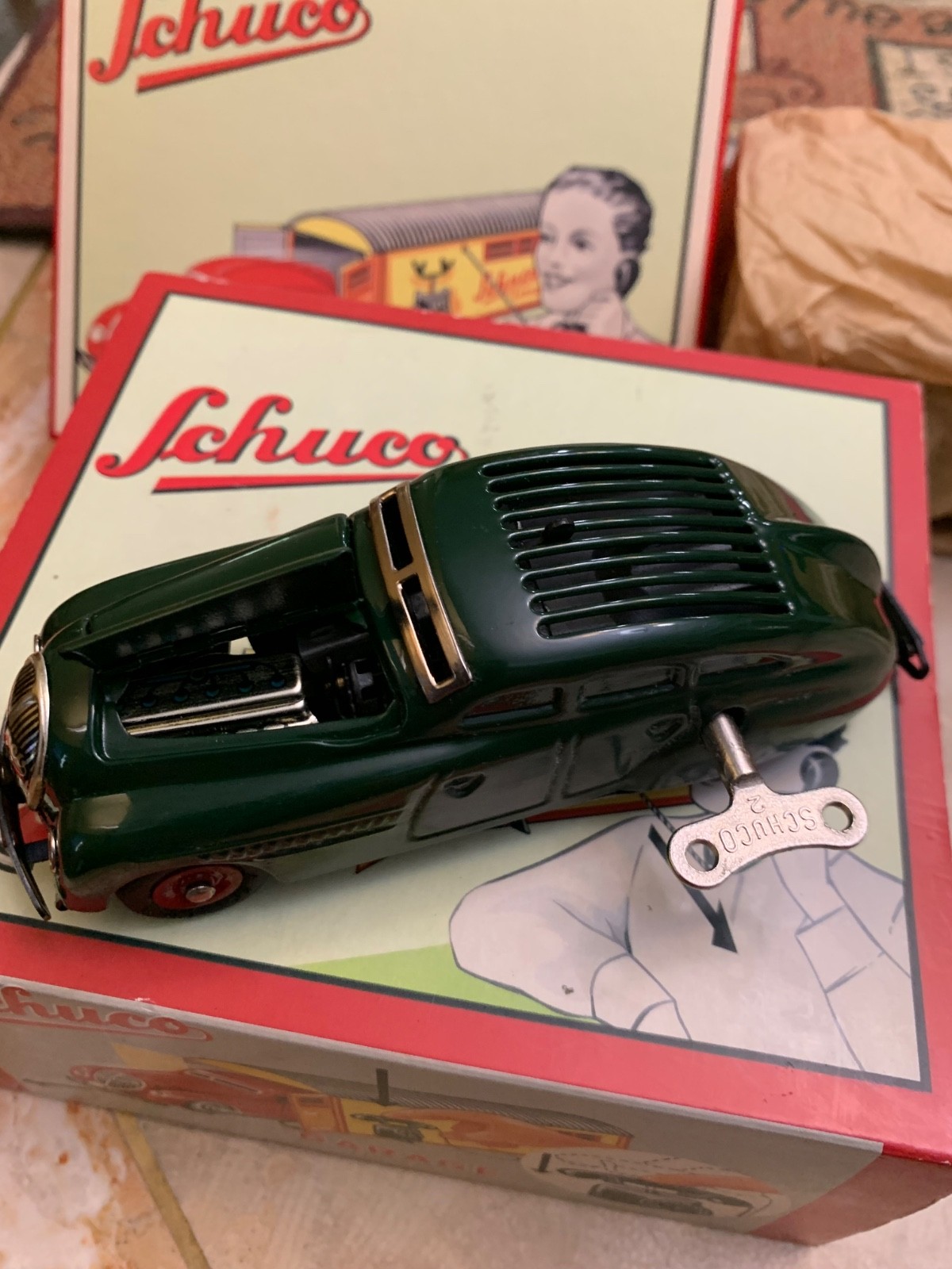 SCHUCO ,CAR ,GARAGE Steel NEVER PLAYED WITH,IN THE BOX.WORKS NEVER USED…