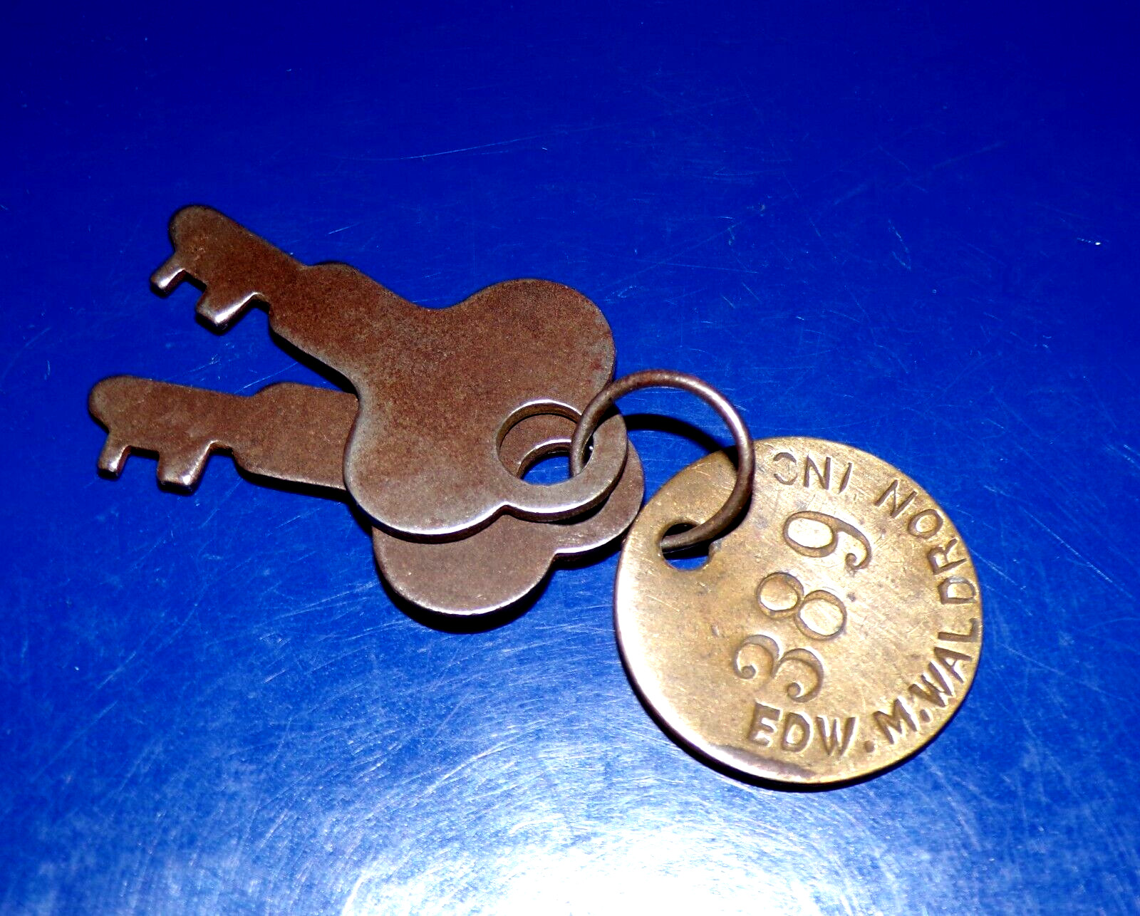 Pair Vintage Flat Square-Cut Keys & “EDW. M. WALDRON INC.” #389 Brass Tag