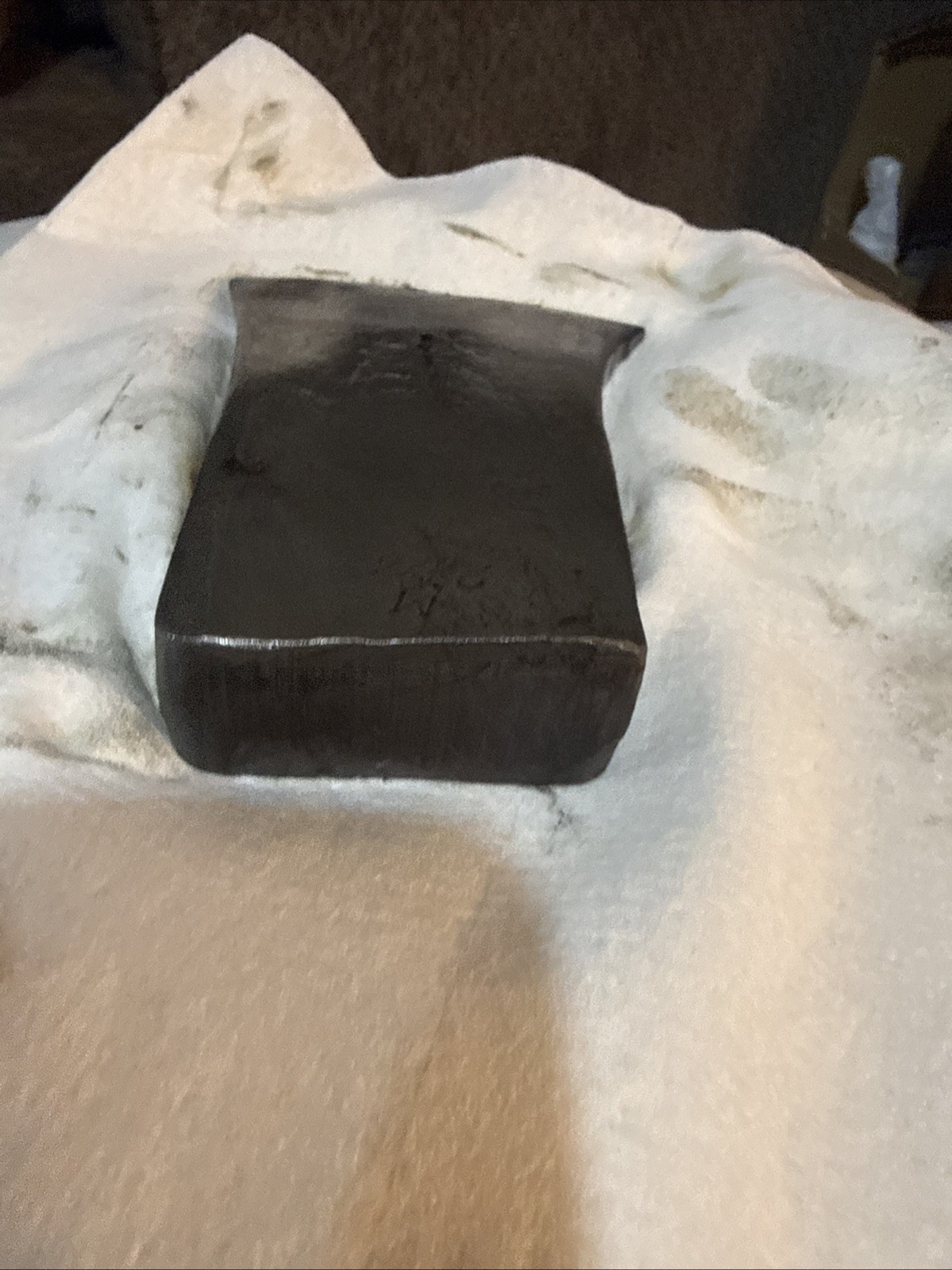This vintage single-bit axe head By Mann Edge Tool Co.