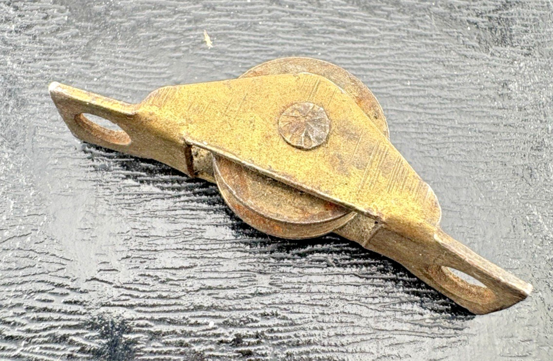 Vintage Brass small roller with casing two screws needed for replacement crafts