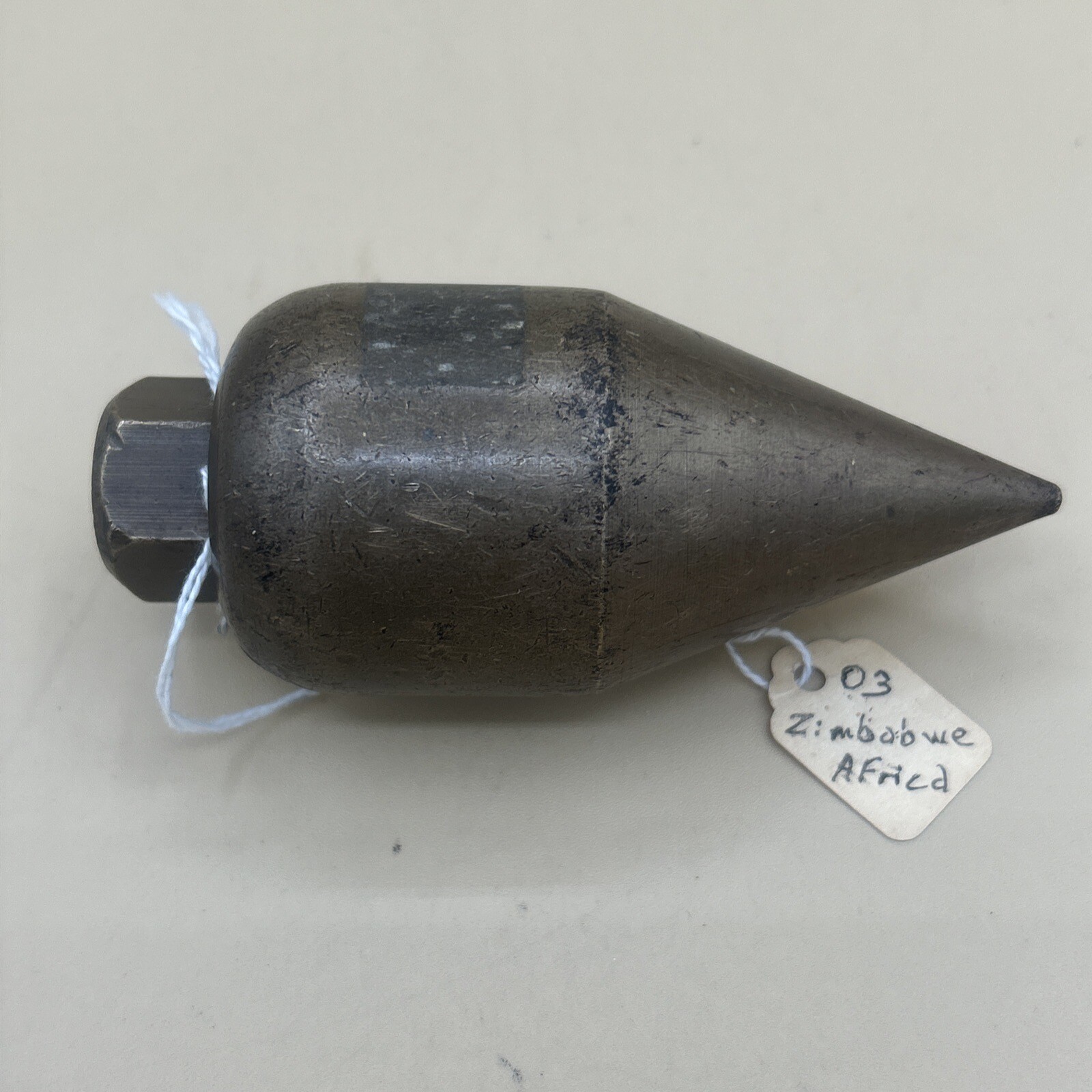 Vintage Brass Plumb Bob 2 lb. 1 oz. 4.5″ long x 2-29/32″ wide.