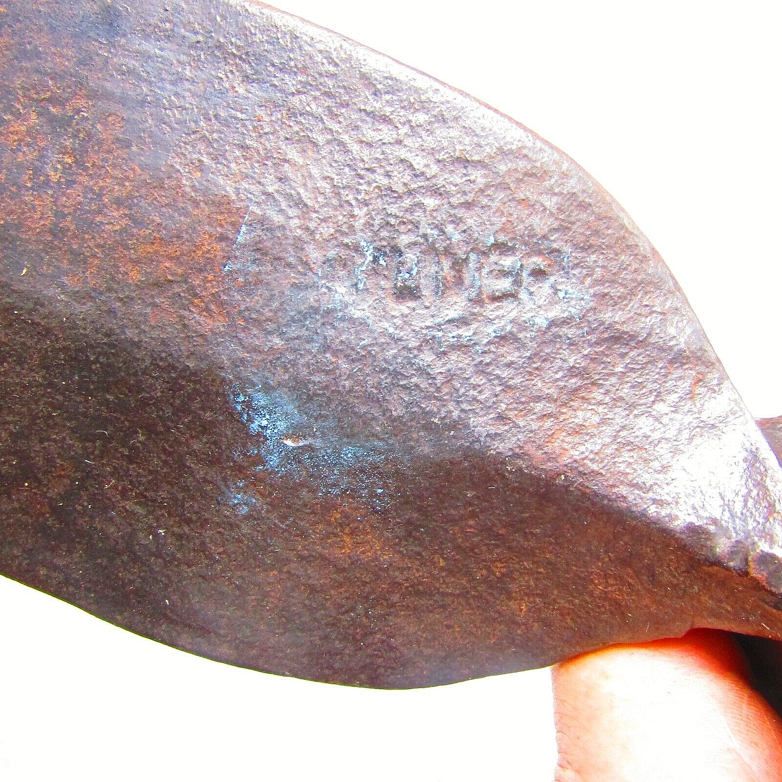 Antique mattock head