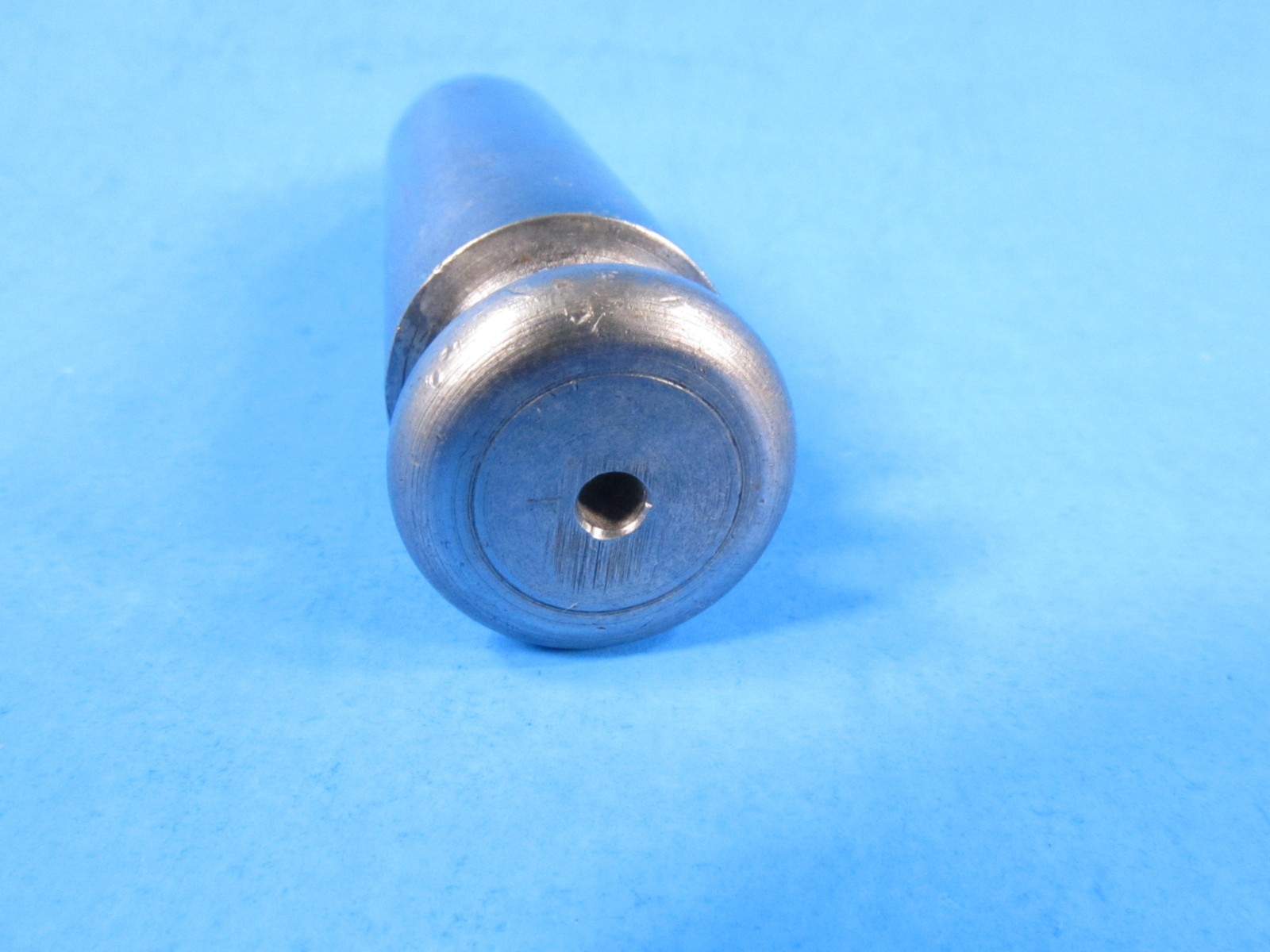 7 ounce steel plumb bob w/ nickel coating & resembles Millers Falls