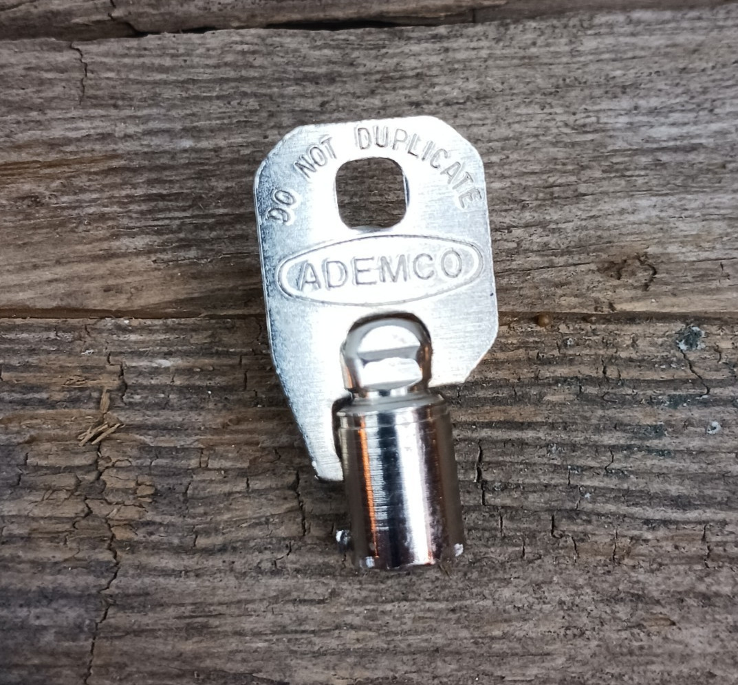 Vintage ADEMCO Vending Machine Key Round Tubular Barrel Key