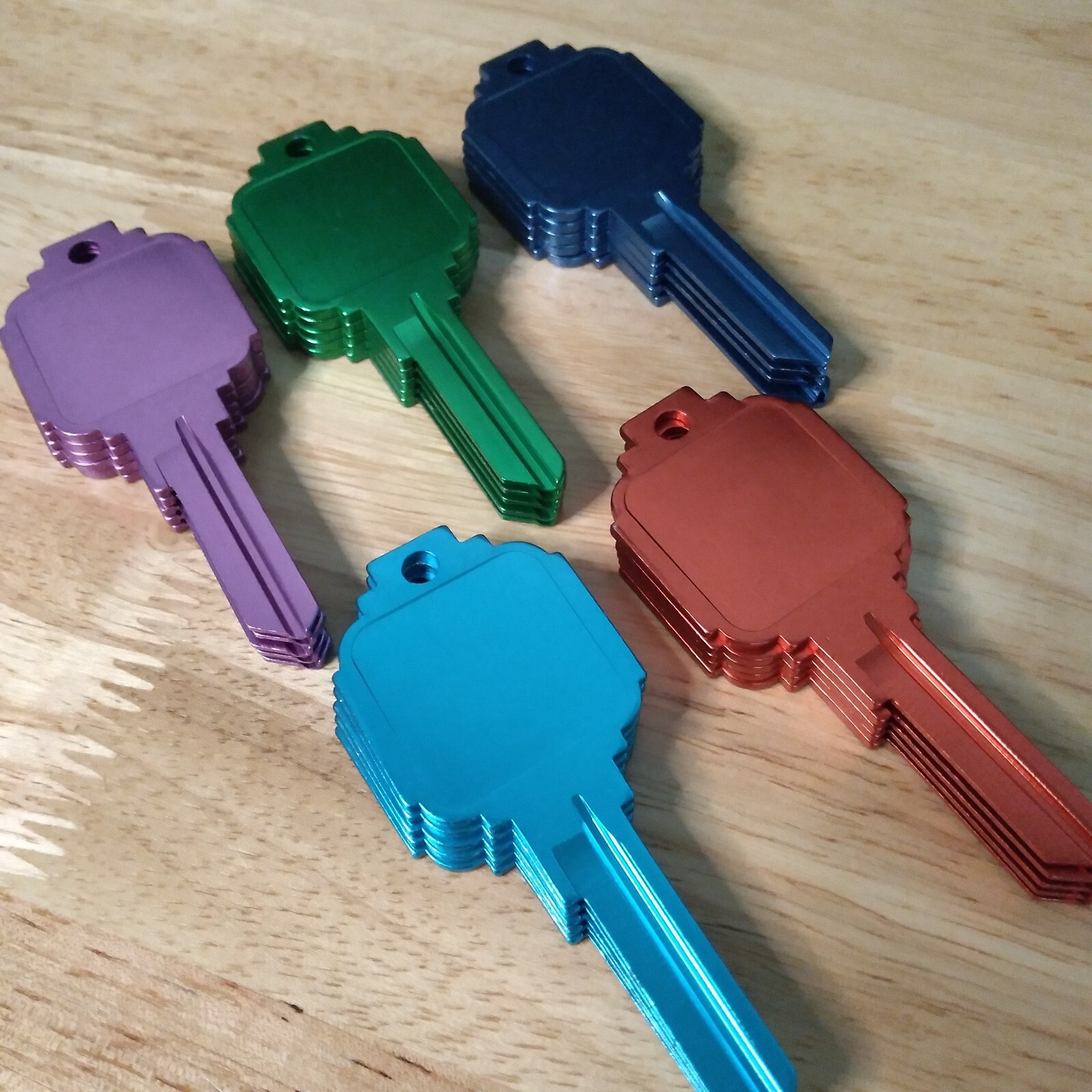 25 Pcs. Titanium Universal Flat Surface House Keys Blanks 5 Colors KW1 Kwikset