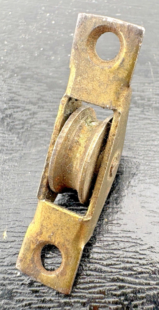 Vintage Brass small roller with casing two screws needed for replacement crafts