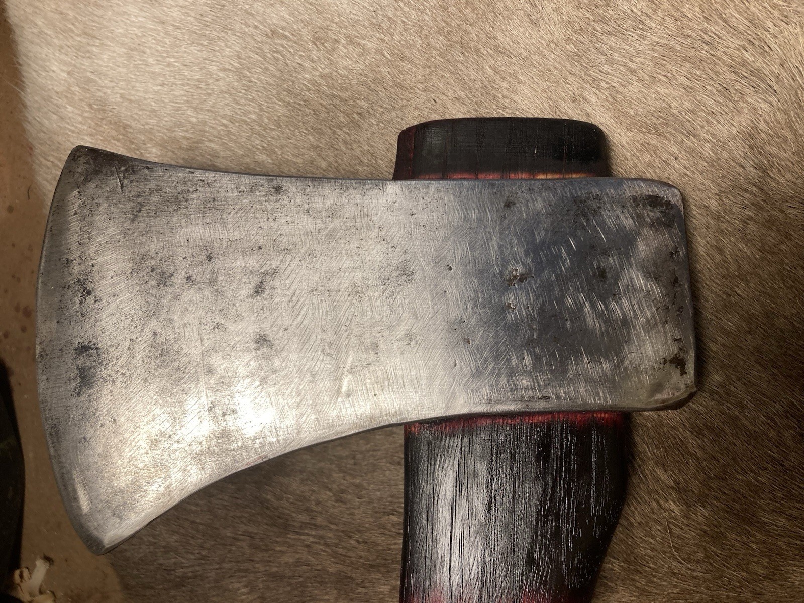 Genuine Norlund , “camper axe” wood handle, red/black. Oil finish