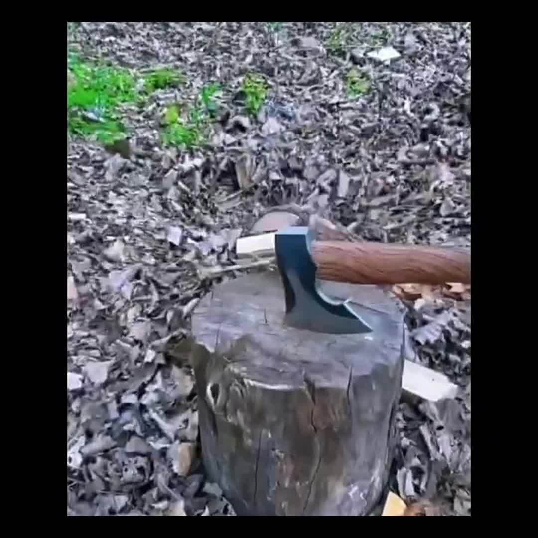 A Versatile Carbon Steel Battle Axe with Wooden Handle